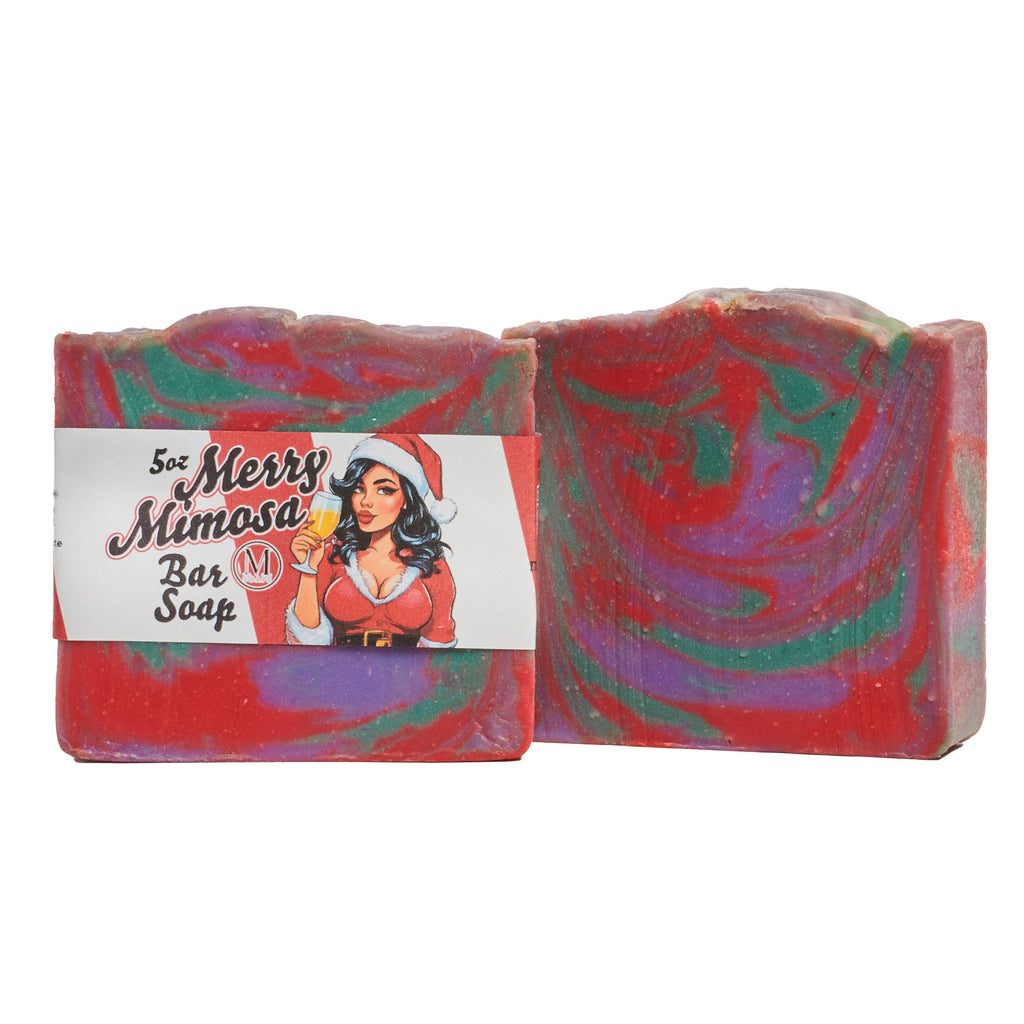 Colorful handmade Merry Mimosa bar soap with bold holiday swirls and a cheeky festive label design.